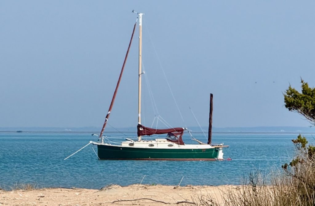 Sailboat Grit anchored off Shackleford Banks, North Carolina